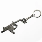 Promotional Hot Game Metal Zinc Alloy Weapon Pan Helmet Gun Shaped Keychain for Souvenir