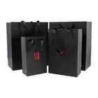 Low MOQ Custom Personalized Printed LOGO White Cardboard Shopping Gift Black Paper Bag