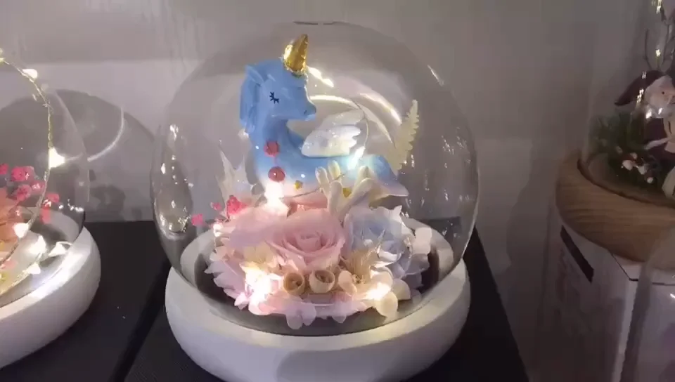 creative birthday gift in glass cover of unicorn
