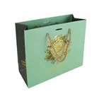 Luxury paper shopping bag with rope handle for boutique shop