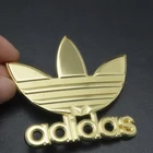China made fashion zinc alloy custom logo metal cap badge