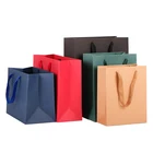 customised logo cheap brown kraft paper custom packing bag with silk handle for cloth/shoes/gift/package