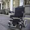 E-Throne! New Innovative design 12'' Automatic Lightweight folding electric wheelchair with lithium battery with CE, PLN17008