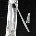 Wholesale square head disposable hotel or travel toothbrush set