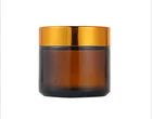Glass 50ml 100ml Cosmetic Cream Containers Clear Amber Glass Jar With Golden Black Silver Lid