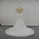 Long sleeve lace wedding dress illusion