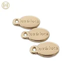 Factory Direct Zinc Alloy Small Logo Engraved Custom Gold Metal Charm Tags