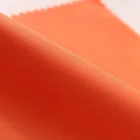 Mildew resistant antibacterial and flame retardant orange taffeta waterproof polyester fabric
