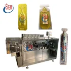 Pouch Filling Machine Automatic Small Mini Stand Up Pouch Liquid Filling Sealing Machine Manufacturer