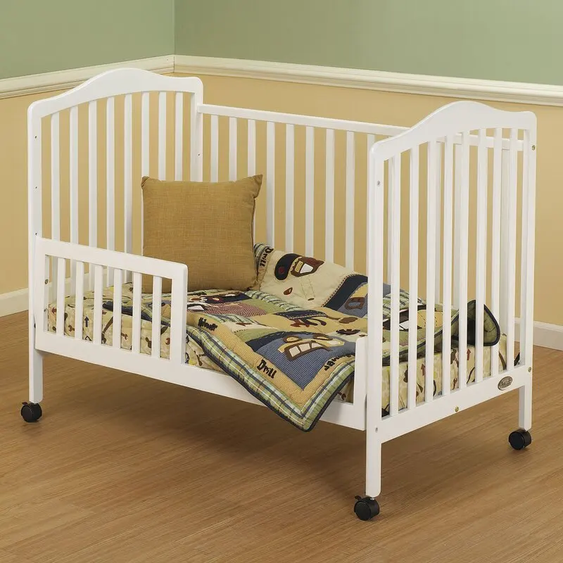 Factory Direct Selling Baby Crib with Drawer. Folding Side. White Color.