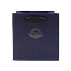 Custom gold stamping printed blue paper gift bag with ribbon handle
