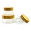 /product-detail/beauty-luxurious-frosted-cosmetic-containers-5g-15g-30g-50g-100g-custom-skin-protect-glass-cream-jar-with-bamboo-cap-62267458093.html