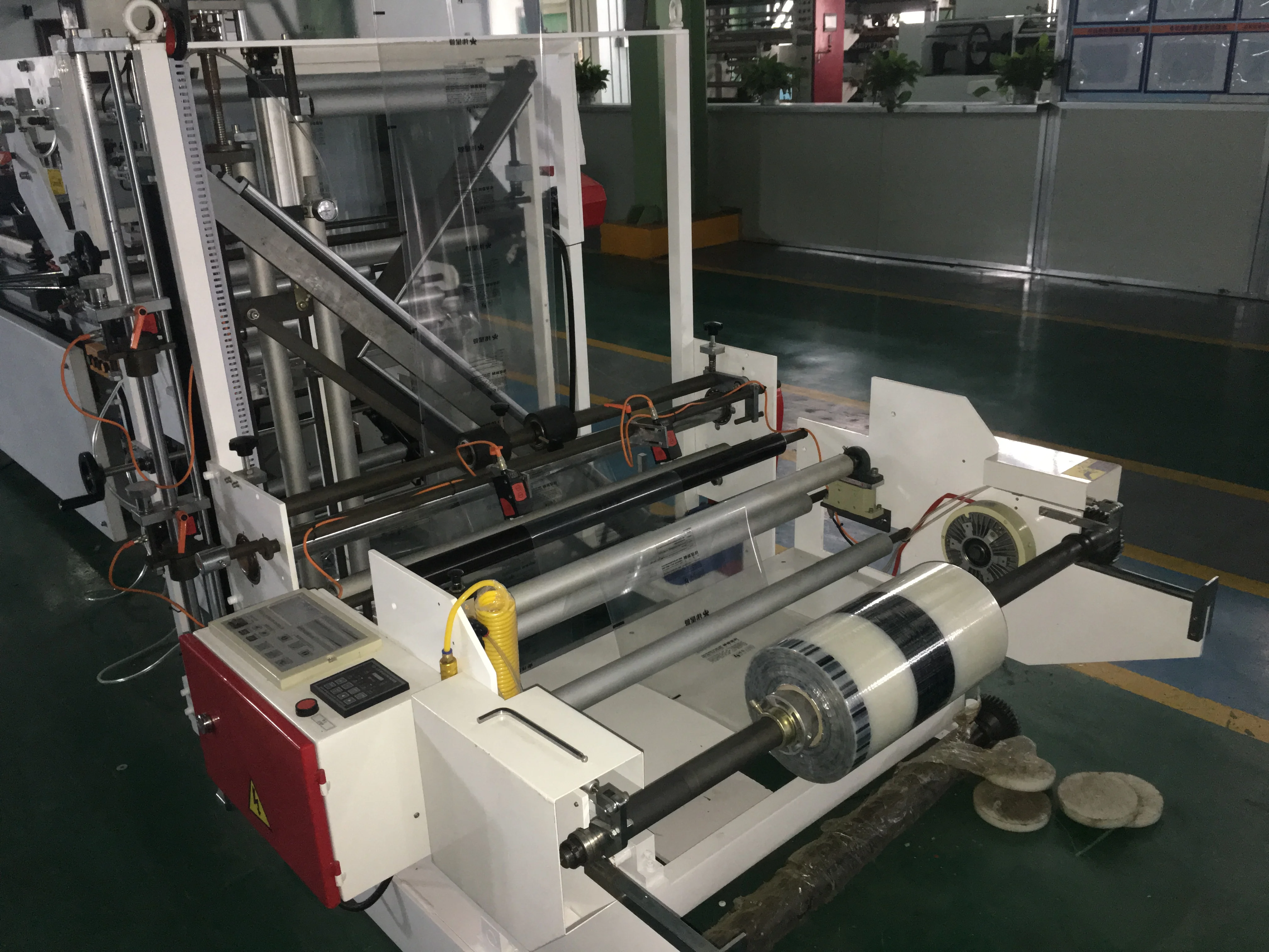 3 sides sealing bag making Machine ( with central sealing function )