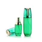Wholesale 50g 40 100 120 ml lotion facial cream packaging green colored cosmetic pump glass bottle for skin care