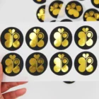 Cheap round printing removable sticker gold foil hot stamping private label roll advertising sticker