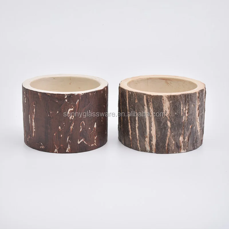 short concrete candle containers with tree design