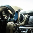 Carliving 自動クランプ 10 ワット急速充電車のワイヤレス充電器スマートセンサーチーワイヤレス自動車電話ホルダー oem