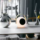 Popular round design splash proof fabric portable outdoor handle mini wireless blue tooth LED light speaker lighting