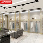 High End Clothes Display Furniture Retail Custom Ladies Golden Black Clothing Racks For Sale