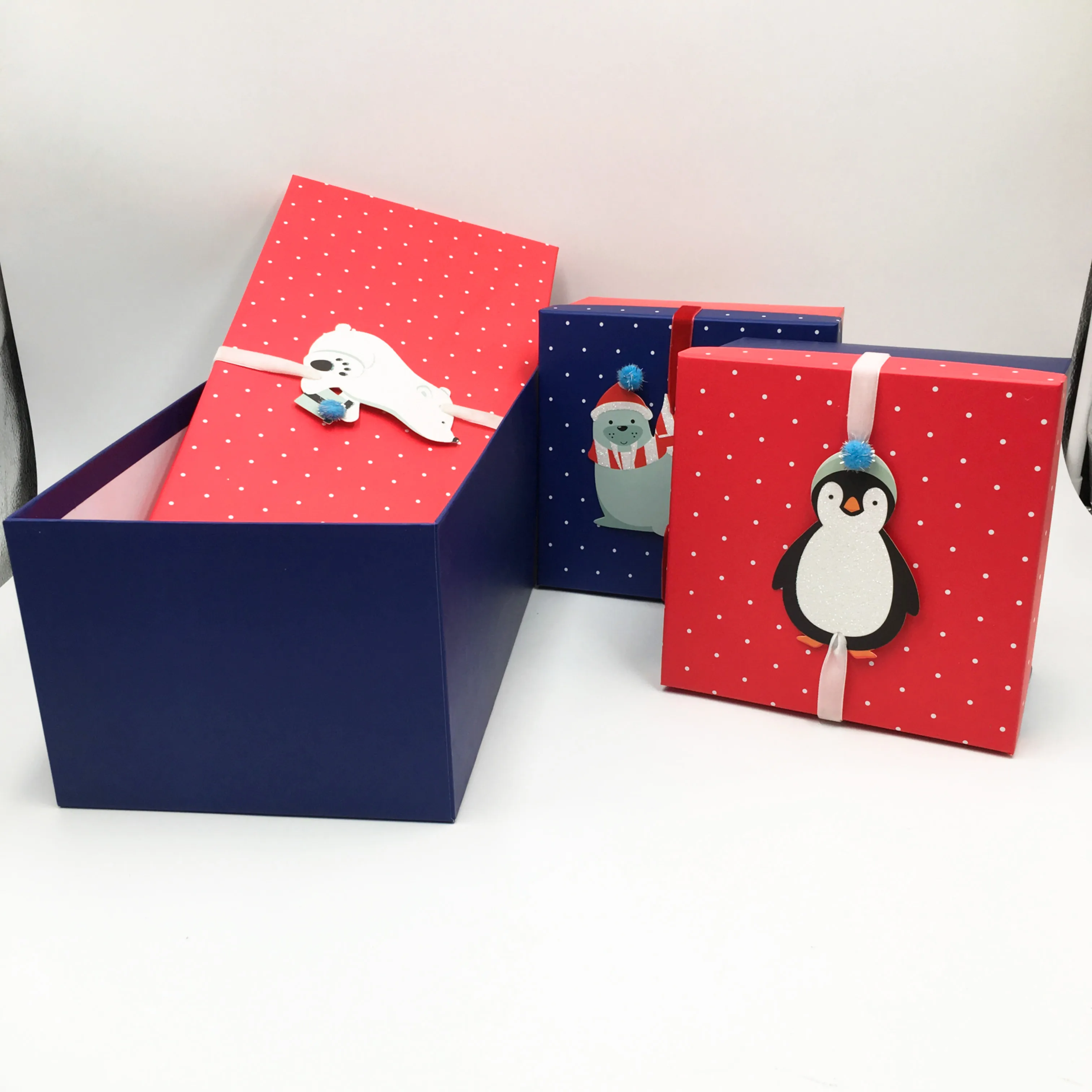 christmas packaging gift box with ribbon and inside two small
