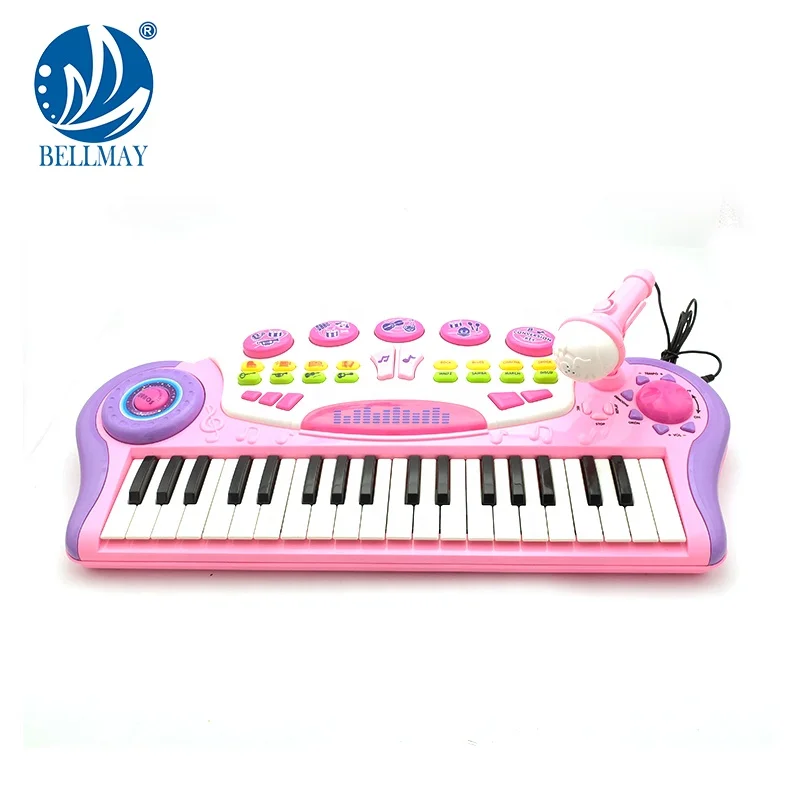 toy grand piano with microphone