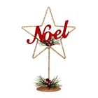 christmas star ornament with letter design for indoor table top decoration .