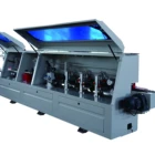 Edge banding machine for furniture sheet processing