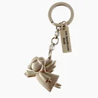 Factory custom feature logo metal keychain custom metal badge with angel