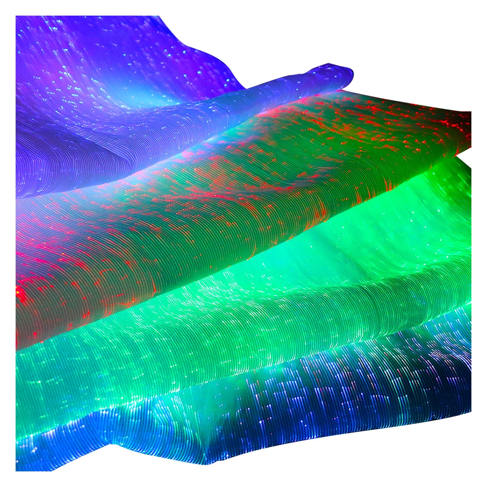 En gros 7 couleurs changeables éclairant lumineux à fibres optiques tissu textile led lueur dans le foncé paillettes tissu