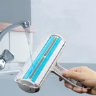Hand Removing Dog Cat Hair From Furniture Carpets Clothing 1 Hand Operate Pet Hair Remover Roller