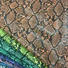 Snakeskin embossed and printed pu leather fabric in stock widely used for garments shoes and bags new arrival