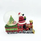 Train Music 2020 New Design Christmas Train Snow Globe Withe Music Resin Santa Claus Water Globes Crystal Ball