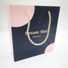 Custom logo gift package printed bolsas reutilizables al por mayor paper bags boutique shopping bag with handles