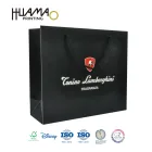 China manufacturer colored fancy paper gift clothes shopping packaging bag