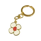 Promotional custom shinny gold hard enamel metal keychain with charms