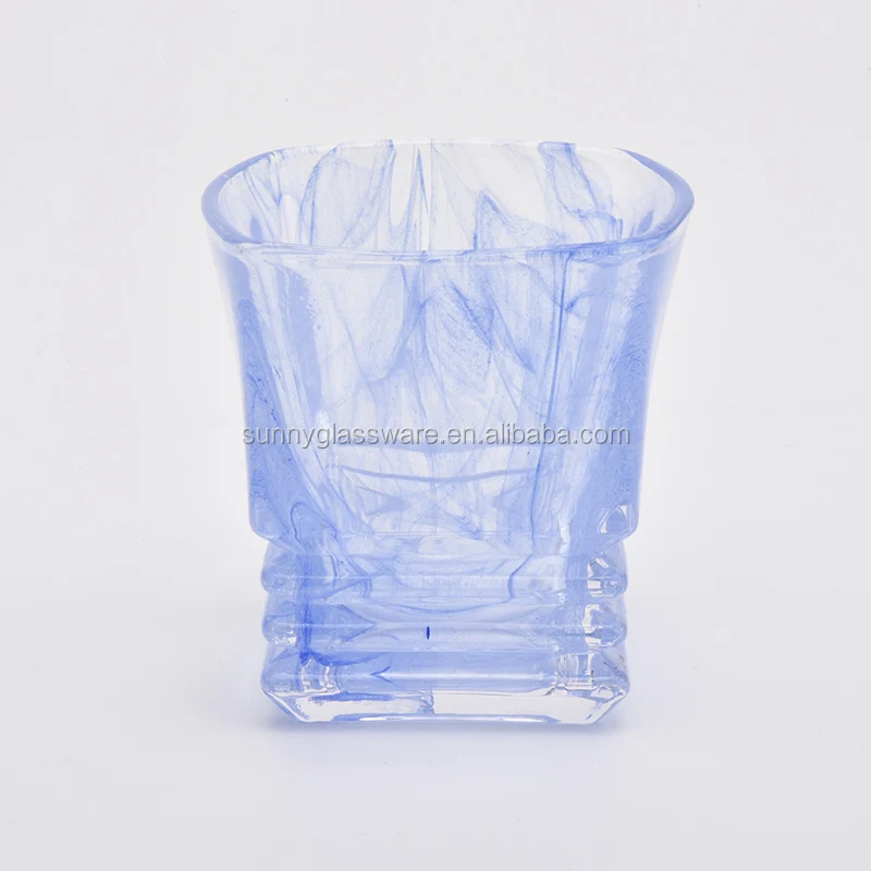 blue glass candle holders with cloudy finish