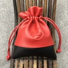 Red Drawstring Jewelry Pouch With Leather And Velvet Stitching