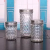 /product-detail/embossed-round-250ml-350ml-600ml-glass-jam-jar-with-metal-lid-60758271297.html