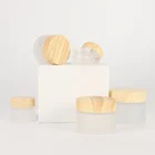 Glass China Supplier Frosted Glass Cream Jar Cosmetic Packaging Round Glass Jars With Wooden Cap