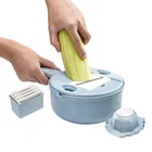 Lovely Kitchen Gadgets Round Multi Functional Vegetable Cutter Potato Peeler Carrot Onion Grater with Strainer Vegetable