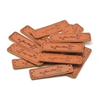 China Direct Supply Embossed clothing label
