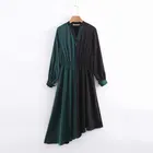 Autumn new black and green two-color stitching ladies fashion elegant pleated irregular dress