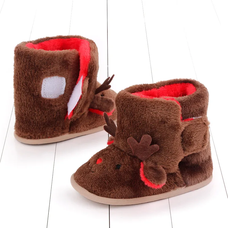 wholesale solid cartoon design boots with warm soft soled baby walking boots supplier