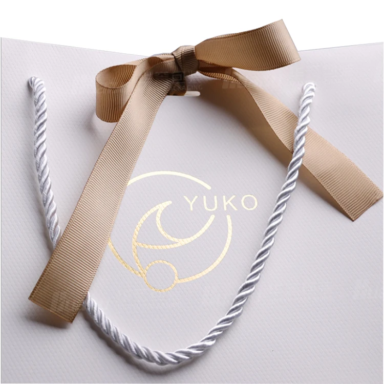 Custom Glossy Laminated White  Fashion Paper Shopping Bag with Bow Tie Ribbon.jpg