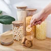 /product-detail/empty-food-storage-glass-jars-glass-with-bamboo-lid-and-silicone-ring-62193597646.html