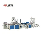 Zipper bag making machine with zipper attachment & auto slider-insert device