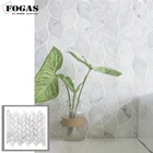 White carrara marble mosaic leaf pattern hallway accent wall tile