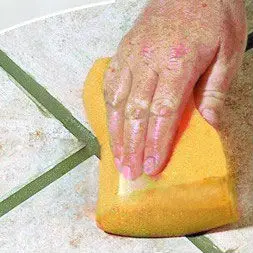 cleaning tile joints.jpg