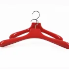 Bright colored red wooden suits and coat hanger