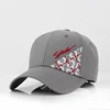 /product-detail/custom-6-panels-checked-polyester-fabric-applique-and-embroidery-logo-face-cap-with-self-fabric-strap-metal-buckle-adjuster-62025811812.html